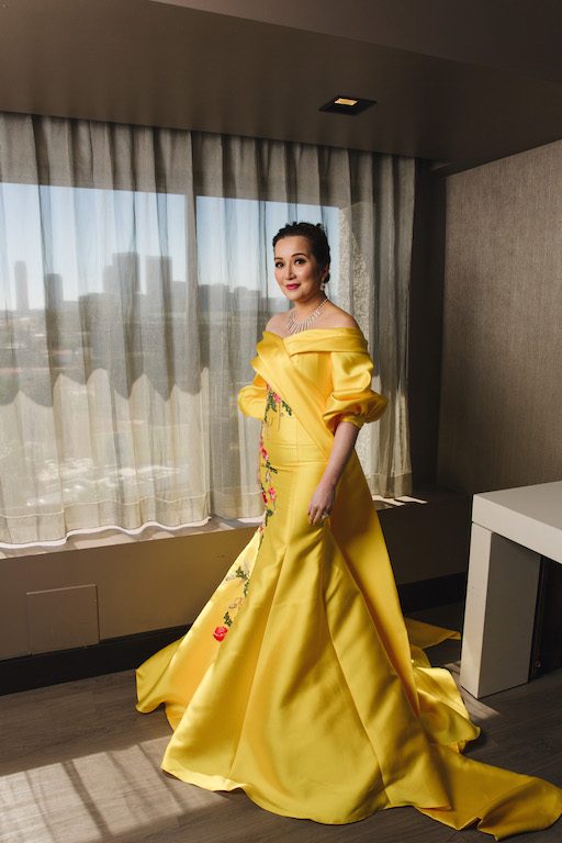 ALTERNATIVE. Among Kris' choices for her emerald carpet look is another yellow gown with floral embroidery. 
