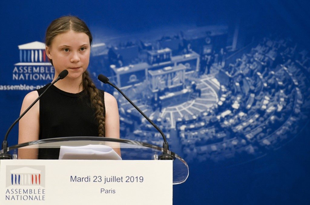 Swedish teen Thunberg slams ‘hate and threats’ as visit divides French parliament