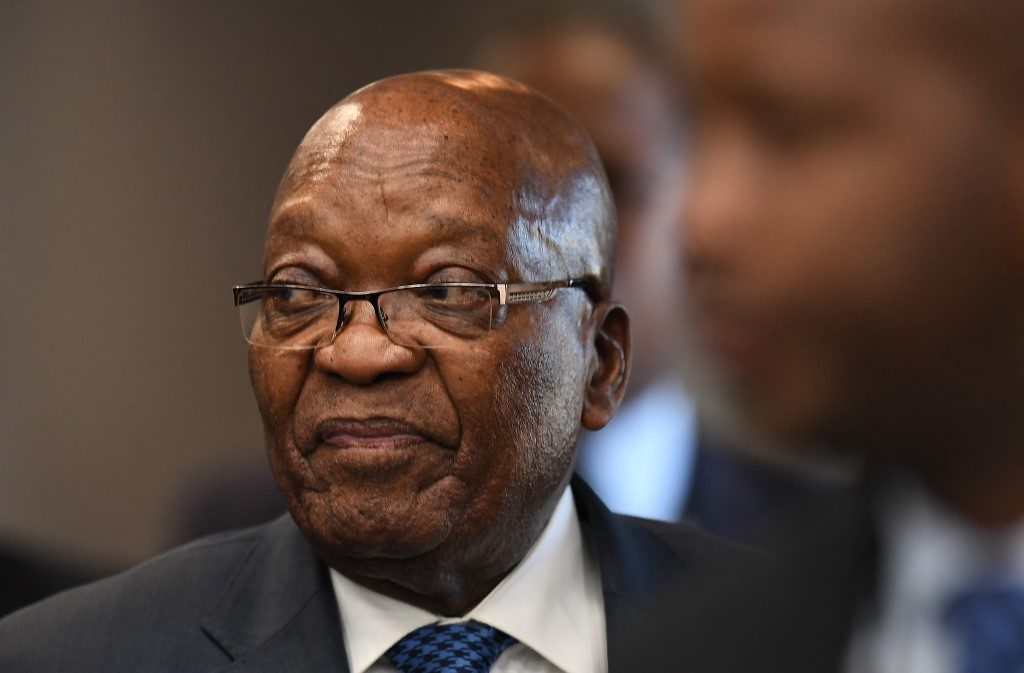 South Africa’s Zuma bats away graft inquiry questions