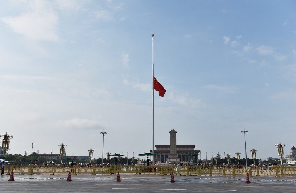 China flag flies at half-mast for Tiananmen crackdown leader
