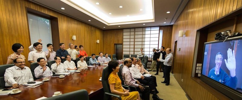 SAYING HELLO. Singaporean ministers talk to Prime Minister Lee Hsien Loong, who is recovering from prostate cancer surgery at the Singapore General Hospital, via video conference, February 17, 2015. Image courtesy Ministry of Communications and Information 