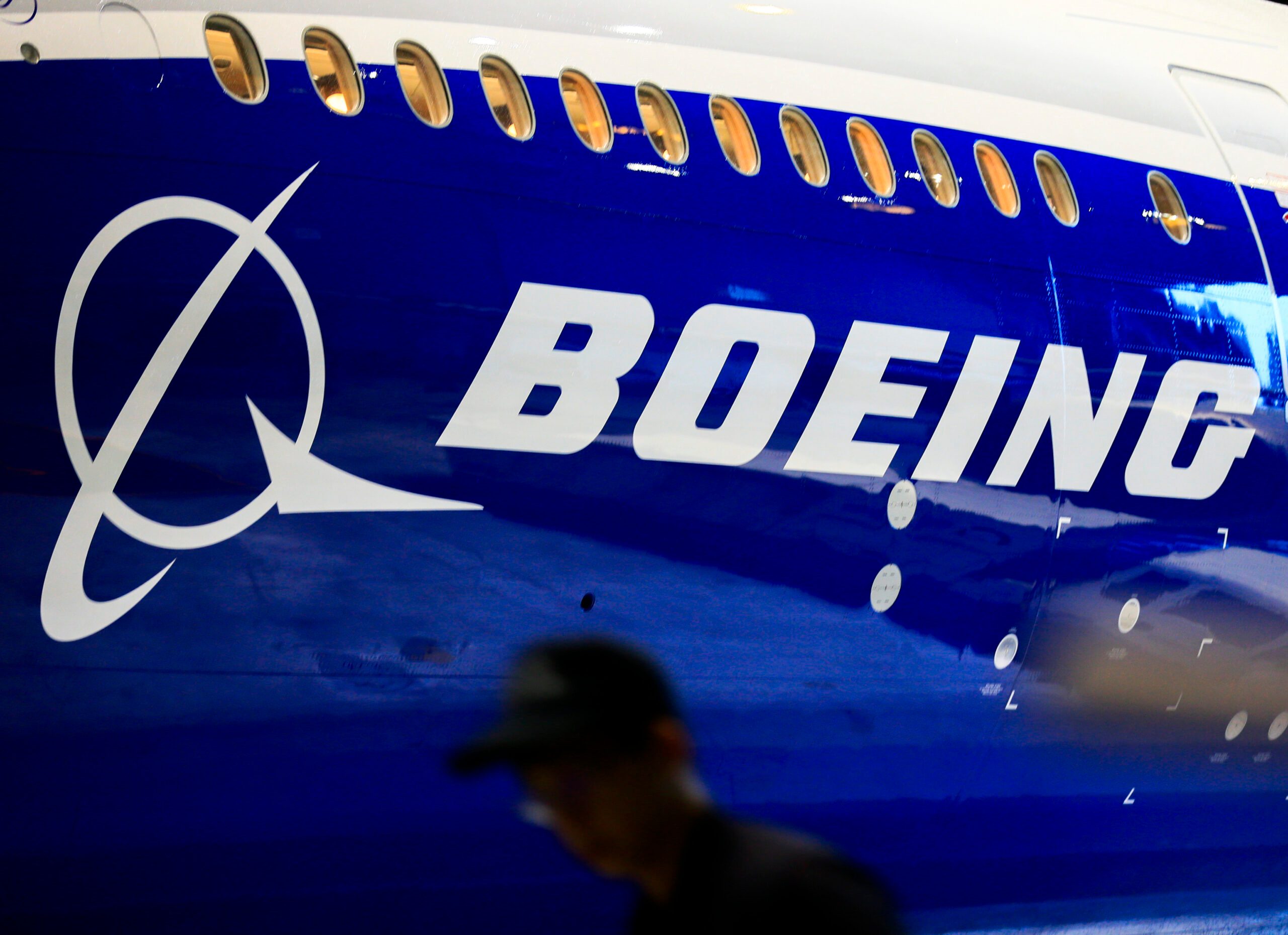Boeing reports $234M loss after unexpected costs