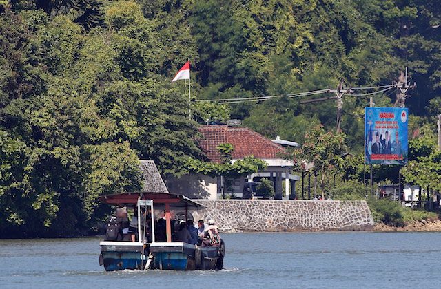EXECUTION ISLAND. A ferry boat carrying the families of Australian death-row prisoners Myuran Sukumaran and Andrew Chan crosses the water for a visit to Nusakambangan prison island at Wijayapura port in Cilacap, Central Java, in March 2015. Photo by EPA 