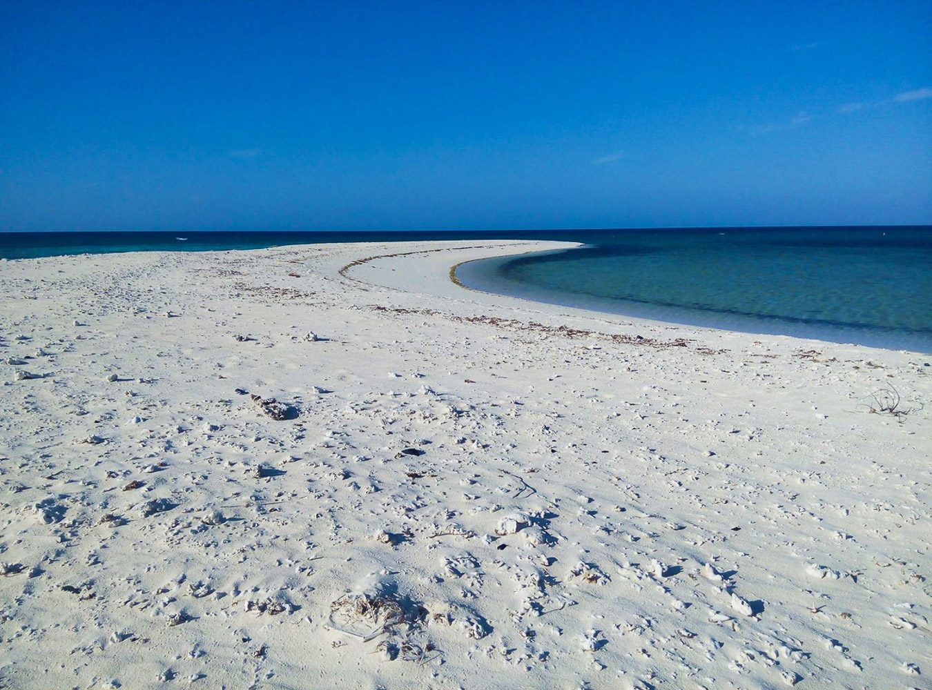 PURE WHITE SAND. Seco Island is a picture of vast white sand amid blue waters. Photo by Ros Flores 
