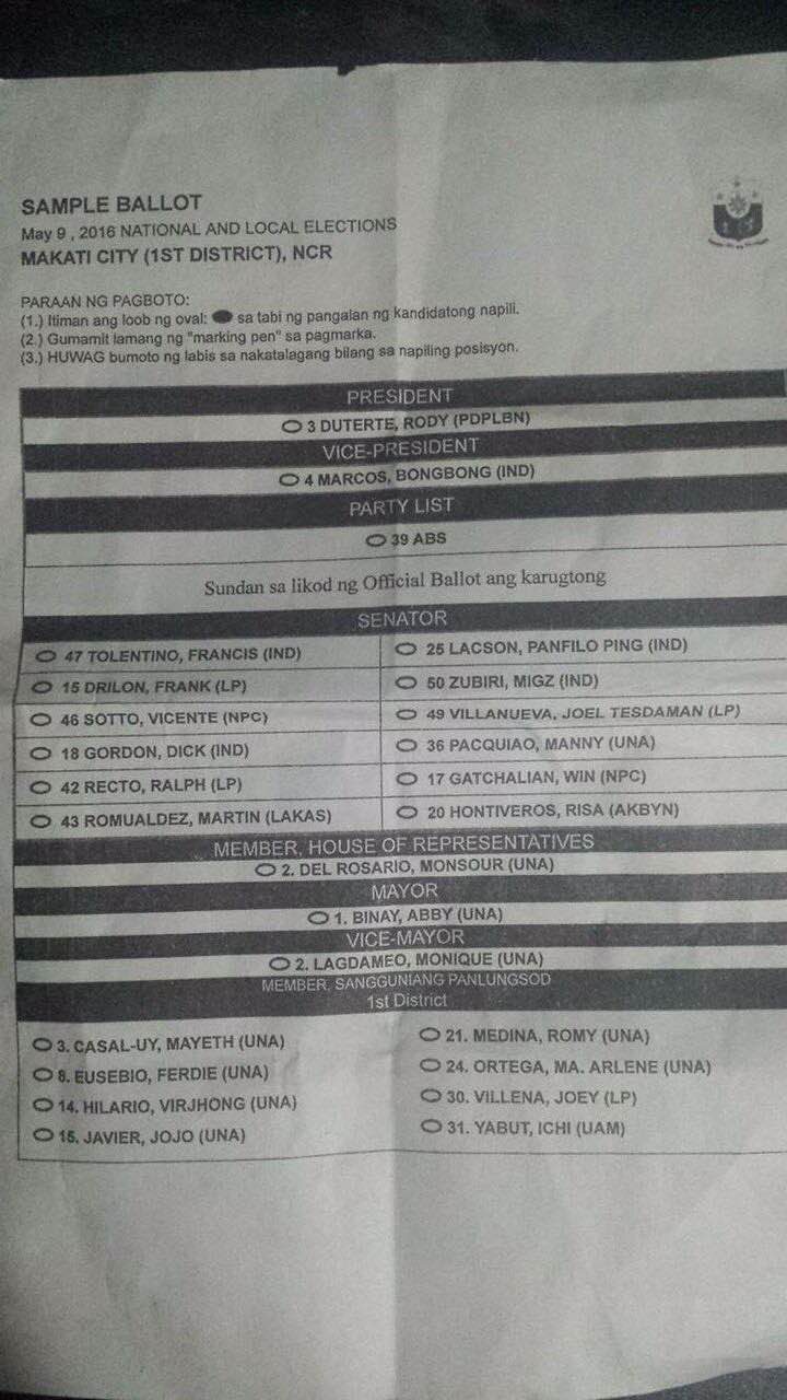 INC ENDORSEMENT. A sample ballot of the INC being handed out in the first district of Makati. Photo sourced by Rappler  