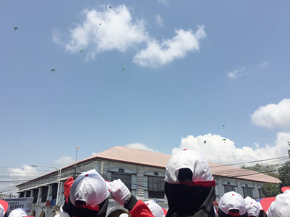 UP IN THE AIR. Paratroopers are seen flying above Vigan during the parade 