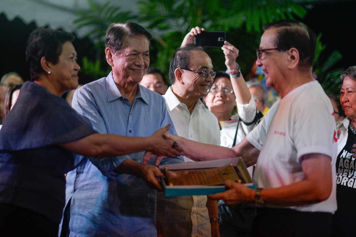 Dr Carlos Magsanoc receives the citation for his wife, journalist Letty Jimenez-Magsanoc 