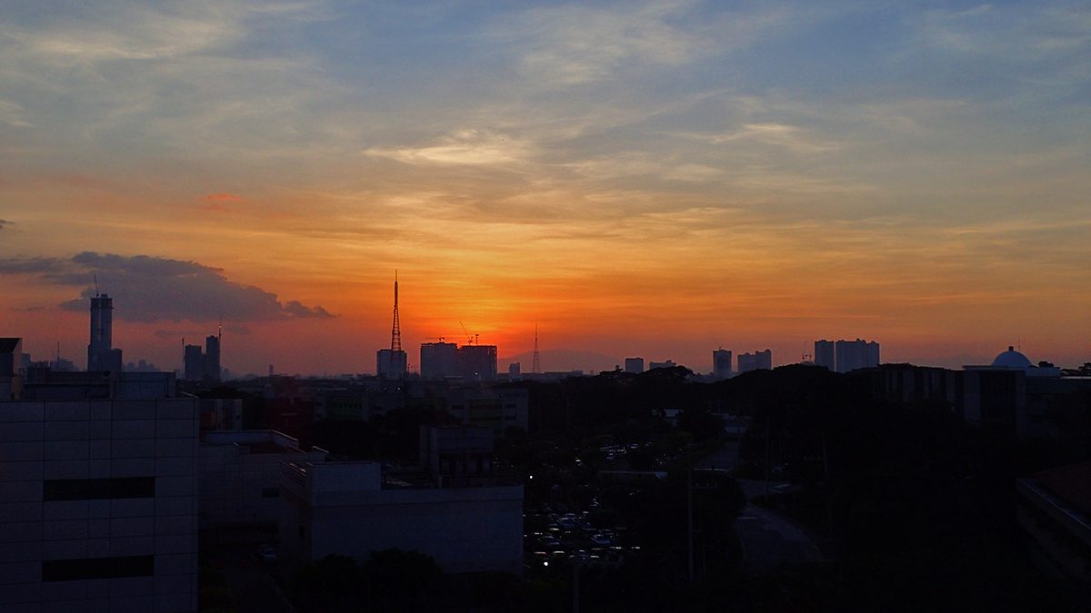 VIEW FROM THE TOP. Or pick a hotel with a roof deck, where you can see the city skyline and sunsets. This photo was taken from the roof deck of Microtel in Quezon City. 