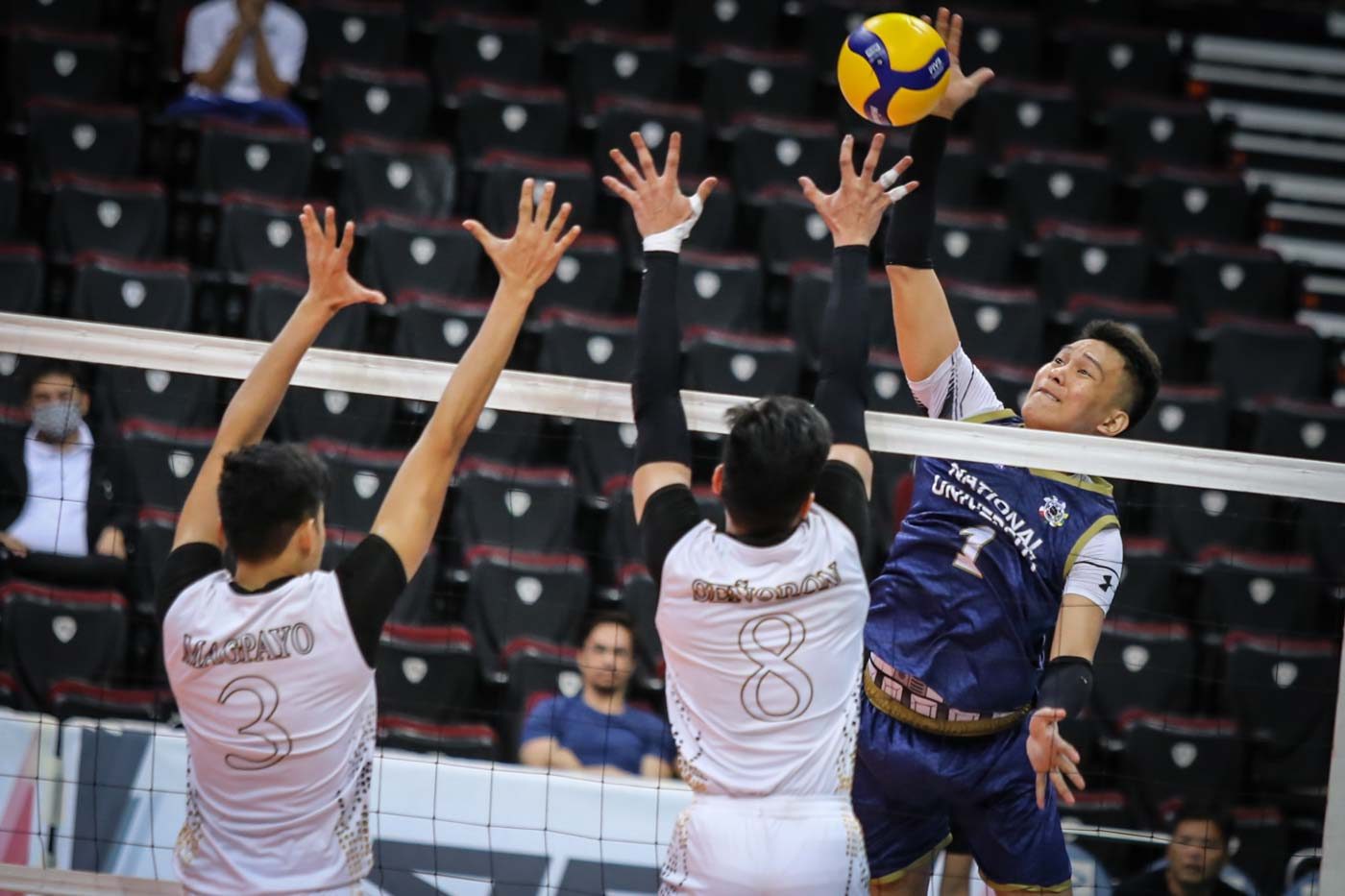 Defending champion NU overcomes UST scare for 1st win