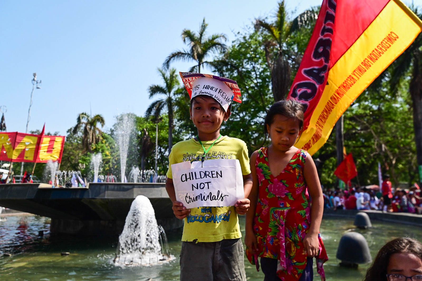 TOO YOUNG TO VOTE. Children join their parents during the Liwasang Bonifacio protest, which was also a political rally to push for candidates from the labor sector. Photo by Alecs Ongcal/Rappler 