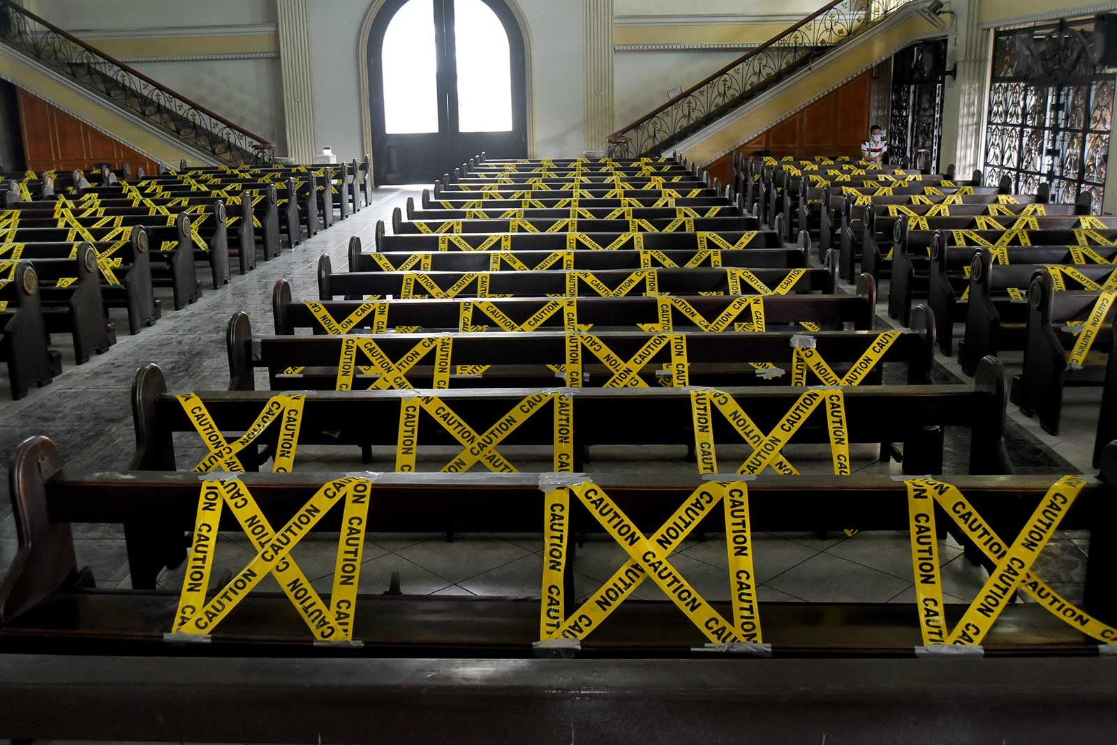 CAUTION. The St. Peter Parish in Quezon City, Philippines prepares for the resumption of church services to the public on June 2, 2020. Photo by Angie de Silva/Rappler 