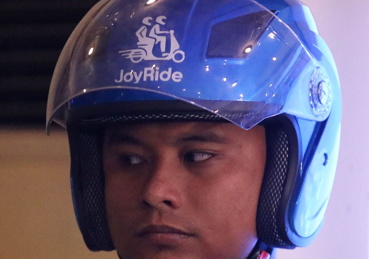 NEW ENTRANT. JoyRide joins the pilot implementation of motorcycle taxi services. Photo by Darren Langit/Rappler 