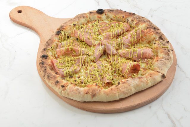 PIE OH MY. This mortadella and pistachio pizza is an unusual but delicious combination