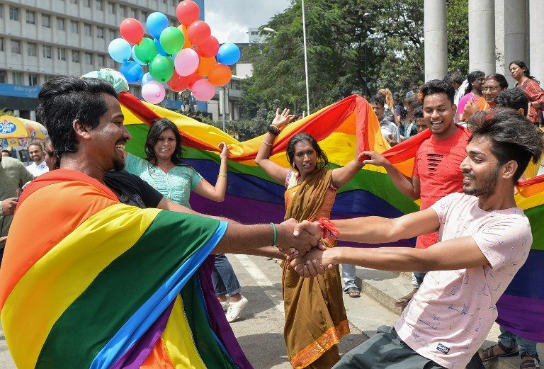 PRIDE. Indian members and supporters of the lesbian, gay, bisexual, transgender community celebrate the Supreme Court decision to strike down a colonial-era ban on gay sex, in Bangalore on September 6, 2018. Photo by Manjunath Kiran/AFP  