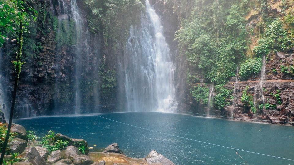 HIDDEN BEAUTY. Getting a massage from Tinago Falls is a refreshing way to spend the day. Photo by Joshua Berida  