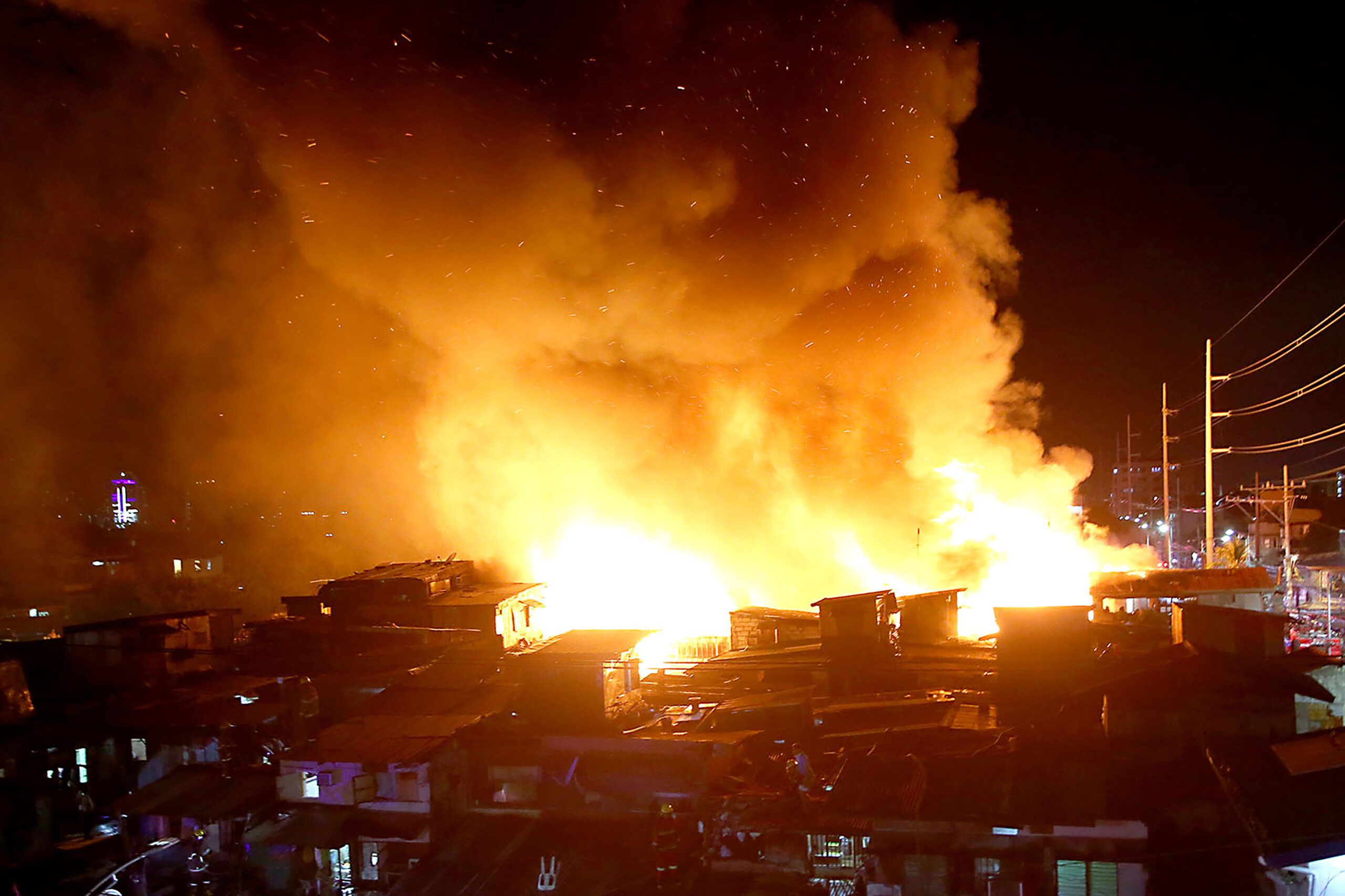 LOOK: 300 families lose homes in New Year fire in Manila