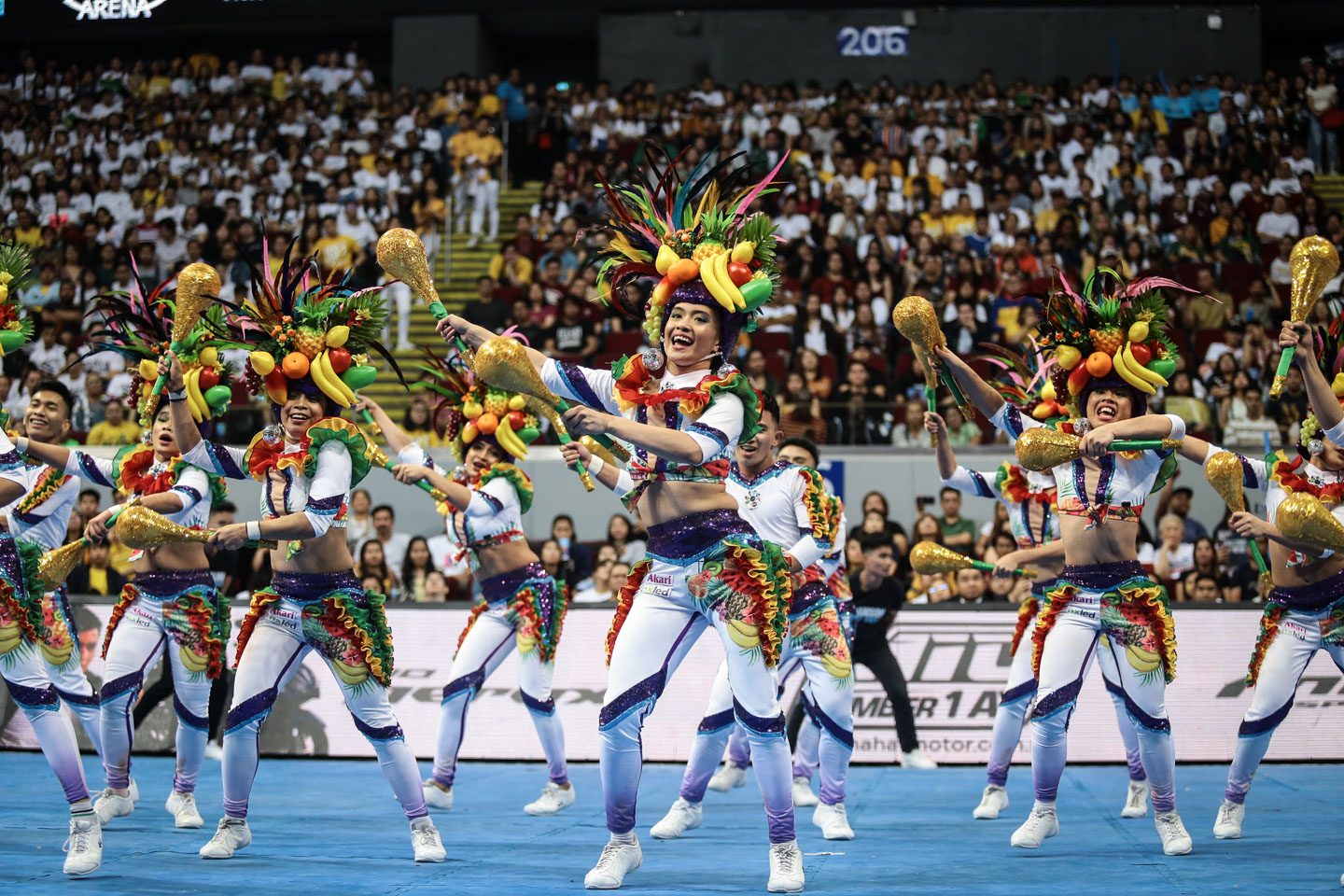 FESTIVE. Adamson continues to bring joy in their performances with big smiles and festive colors. Photo by Josh Albelda/Rappler 
