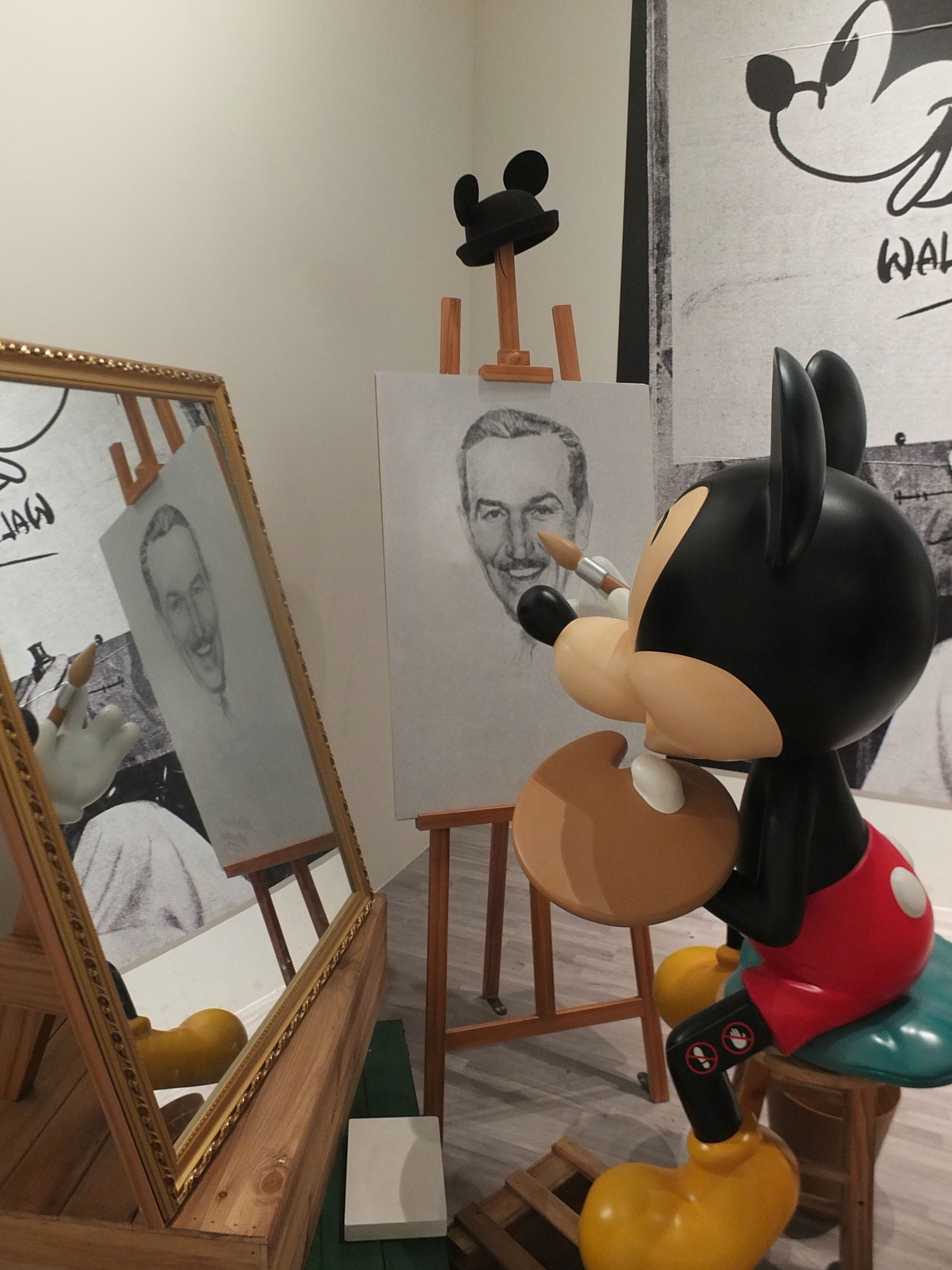 CREATOR. Mickey Mouse is seen drawing Walt Disney.  