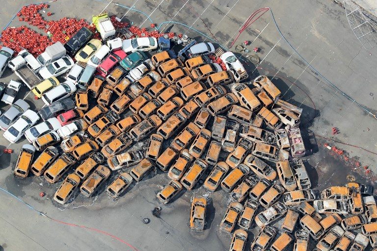 MASSIVE DAMAGE. An aerial view of passenger vehicles which were burnt after a storm surge and strong winds caused by typhoon Jebi in Nishinomiya, Hyogo prefecture on September 5, 2018. Photo by Jiji Press/AFP  