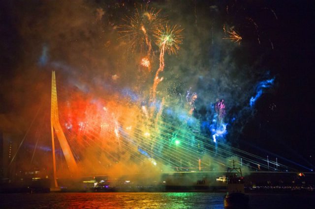 A photo taken on January 1, 2016 shows fireworks over the Erasmusbrug (Erasmus Bridge) during New Year's Eve in Amsterdam. Photo by Robin Utrecht/ANP/AFP  