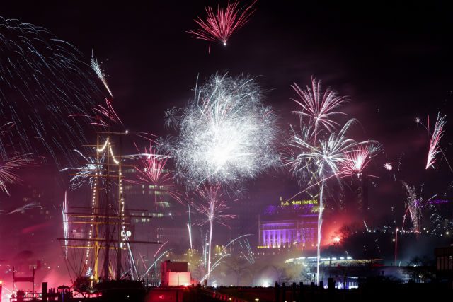 Fireworks go off near the St. Pauli Piers at the port of Hamburg, Germany, January 1, 2016. Photo by Axel Heimken/EPA 