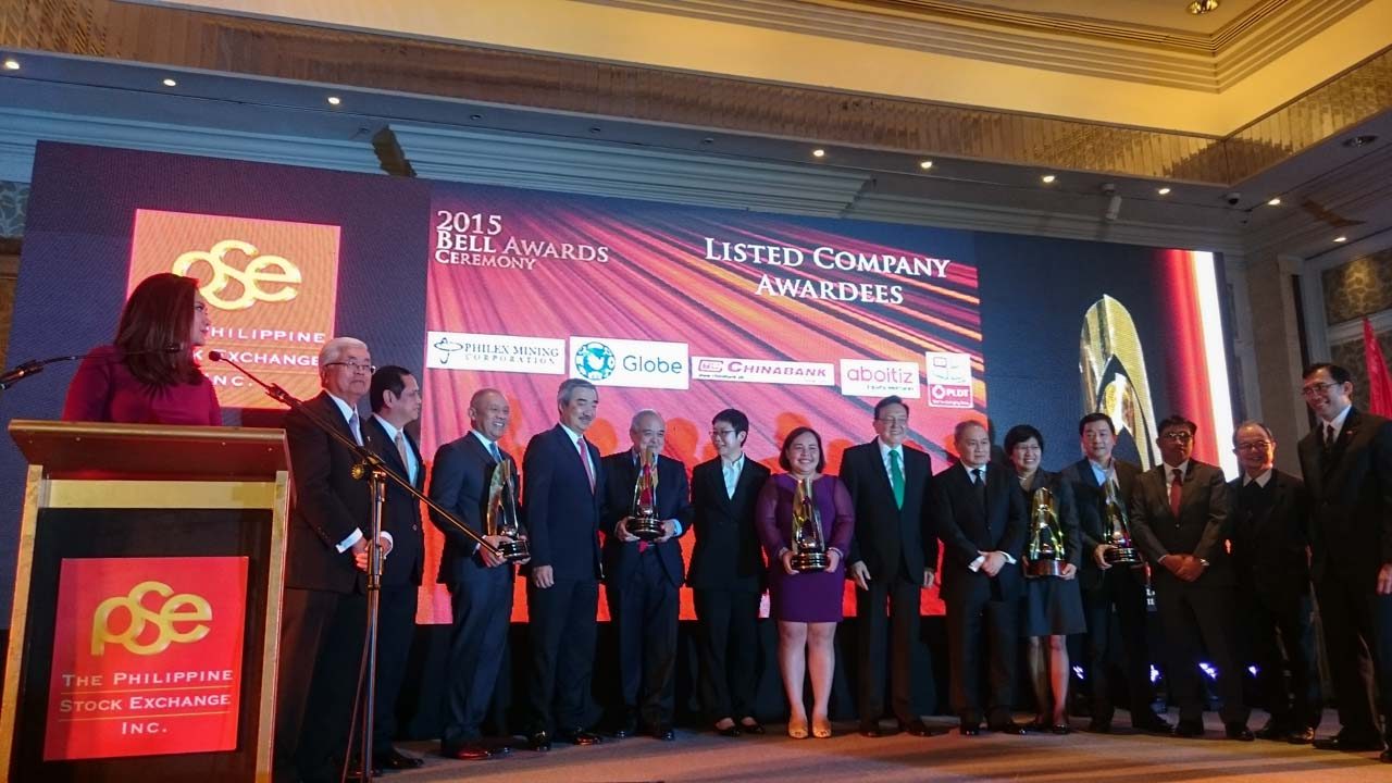 LISTED WINNERS. Representatives from the 5 listed company winners Philex Mining, Globe Telecom, China Bank, Aboitiz Equity Ventures, and PLDT hold their trophies onstage.  