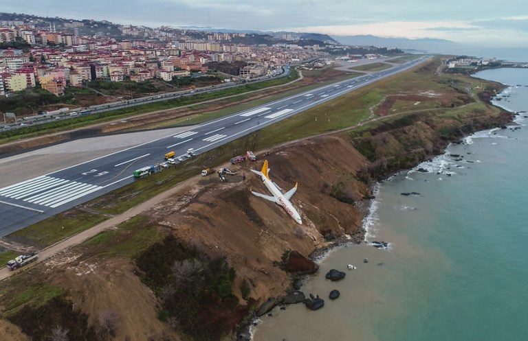 Turkish passenger plane skids off runway onto seaside cliff
