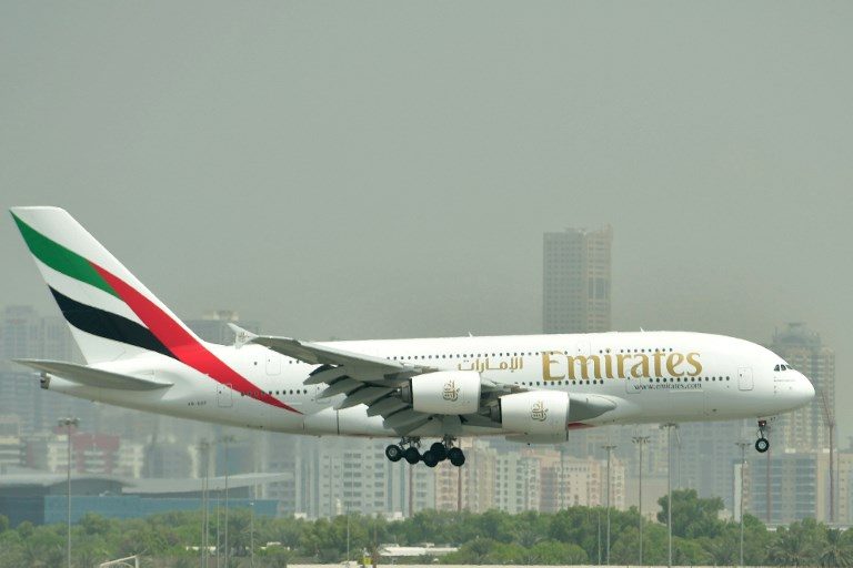 EMIRATES. An Emirates plane prepares to land at the Dubai International Airport on September 14, 2017. File photo by Giuseppe Cacace/AFP 