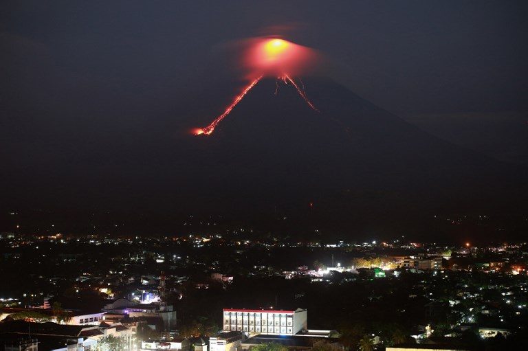 Mayon Volcano ‘fireworks’ draw tourists as residents flee