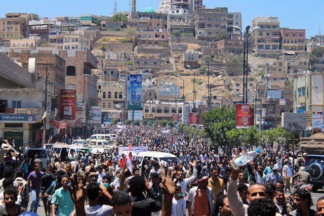 Yemenis protest Houthi presence in Taiz, Yemen, 25 March 2015. Stringer/EPA 