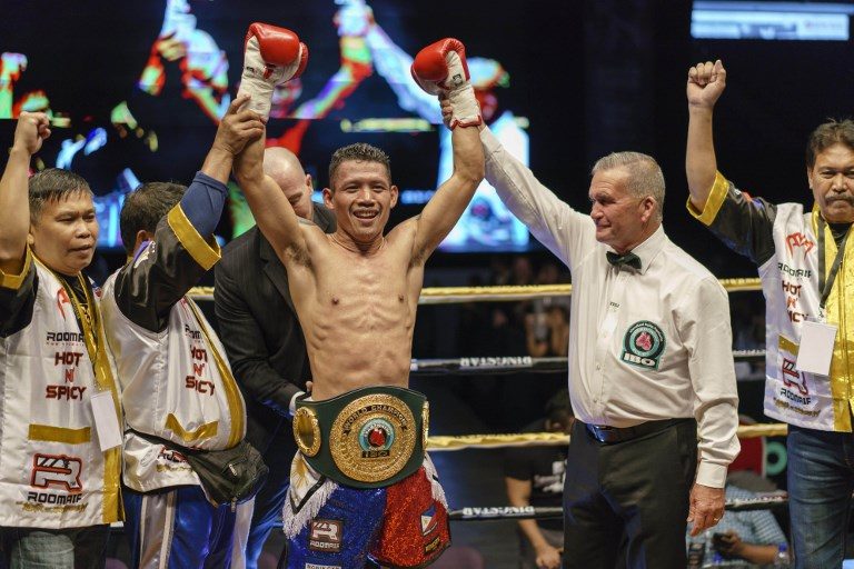 RISING STAR. Little-known Michael Dasmariñas makes a name for himself by clinching the IBO belt. File photo by Nicholas Yeo/AFP 