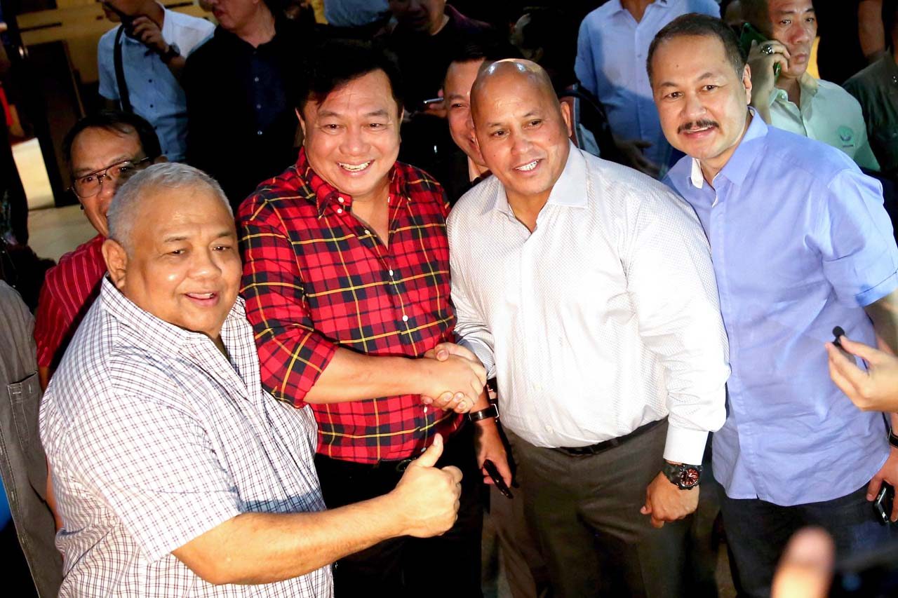 HANDSHAKE. Executive Secretary Salvador Medialdea does the thumbs up sign while House Speaker Pantaleon Alvarez and Philippine National Police chief Ronald dela Rosa shake hands during the latter's birthday celebration at Camp Crame on January 22, 2017. Photo by Alfred Frias/Presidential Photo   