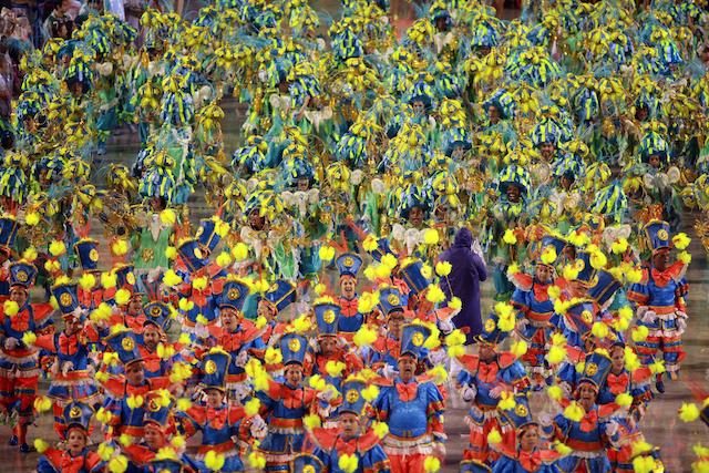 Members of the Samba Unidos do Viradouro troupe perform during the carnival parade in the streets of Rio de Janeiro, Brazil, 15 February 2015. Luiz Eduardo Perez/EPA 