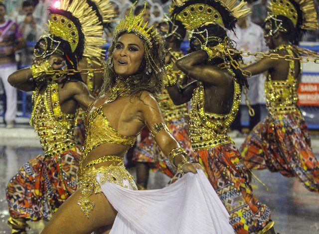 Rain, scandal can’t dampen Rio’s carnival