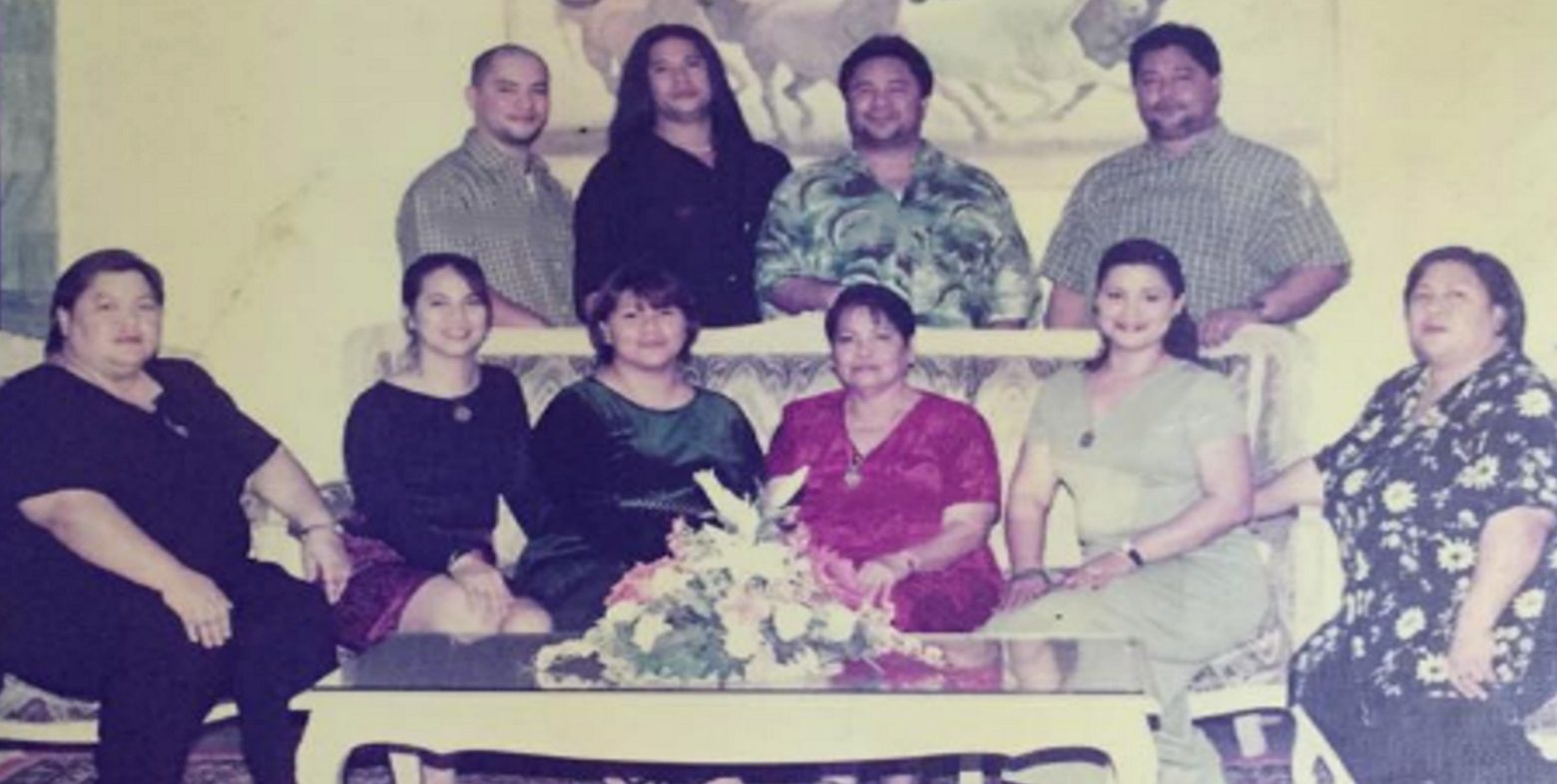PAROJINOG CLAN. Octavio's children and their mother pose for a family picture. Sourced photo   