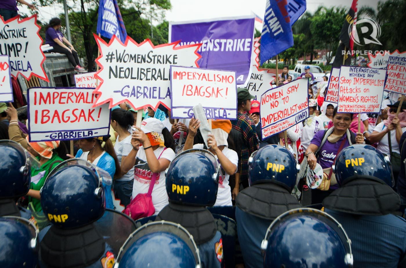 #WOMENSTRIKE. Womens group Gabriela stage their own rally at the US Embassy. 