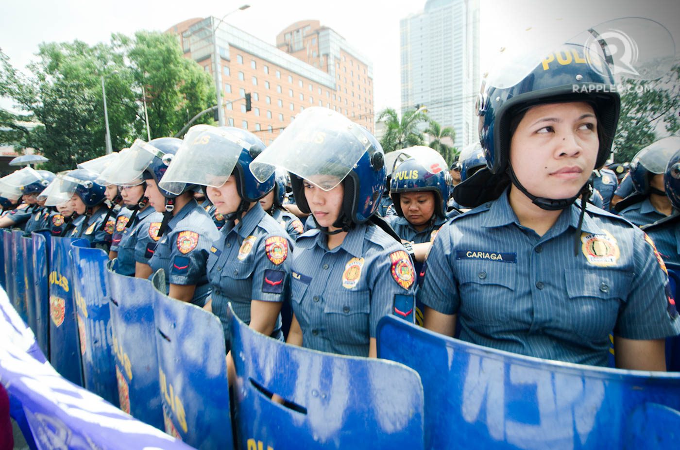 BLOCKING FORCE. The embassy marchers were met by the police, who mostly were women. 