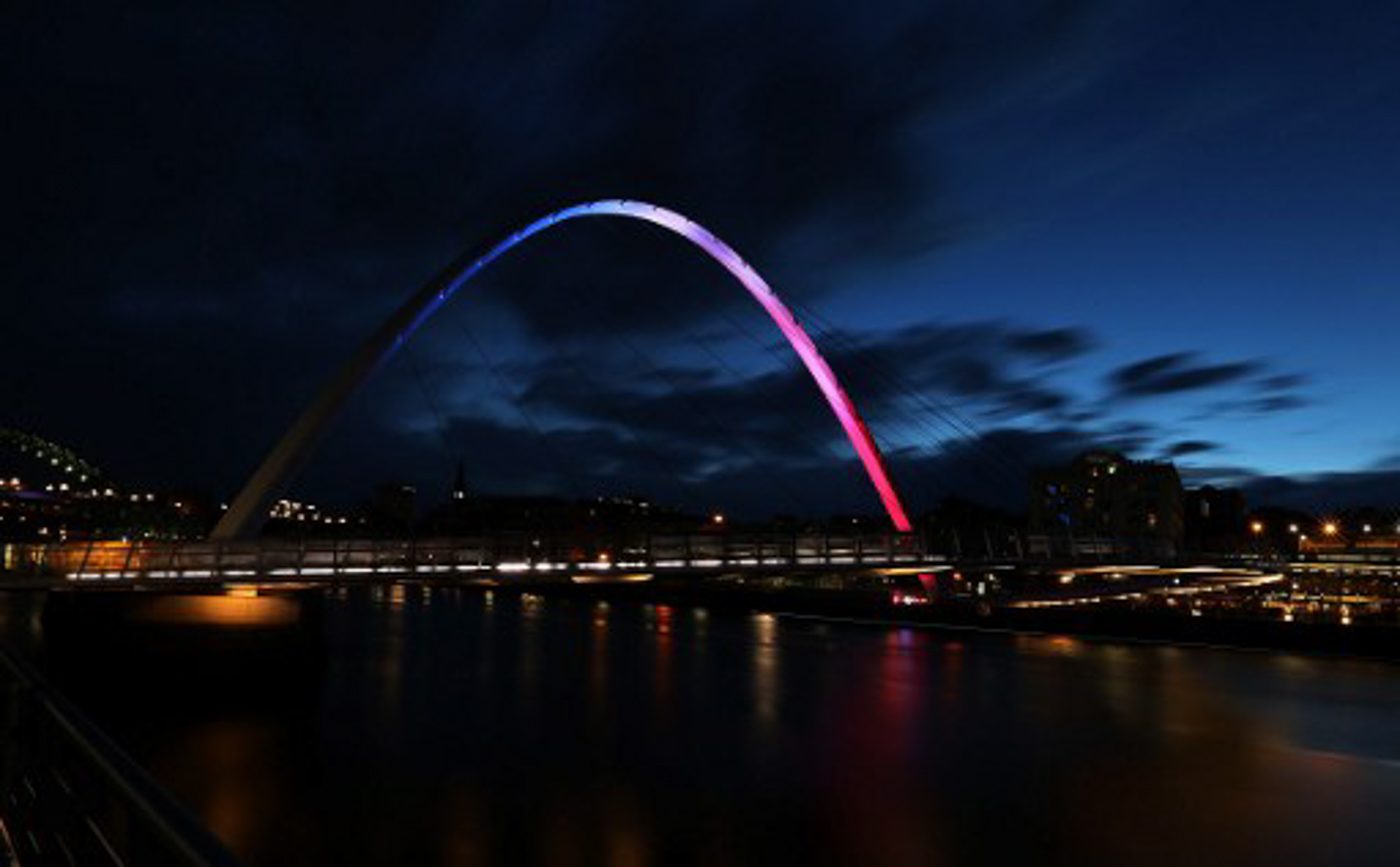 ENGLAND. The Gateshead Millennium Bridge which spans the River Tyne.  