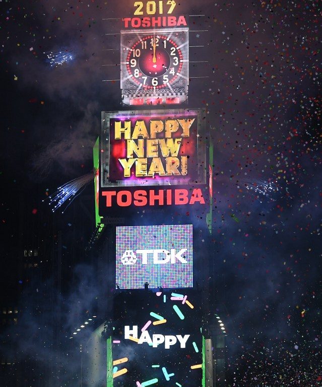 New Year 2017 arrives in Times Square on December 31, 2016 in New York City. Photo by Angela Weiss/ AFP  