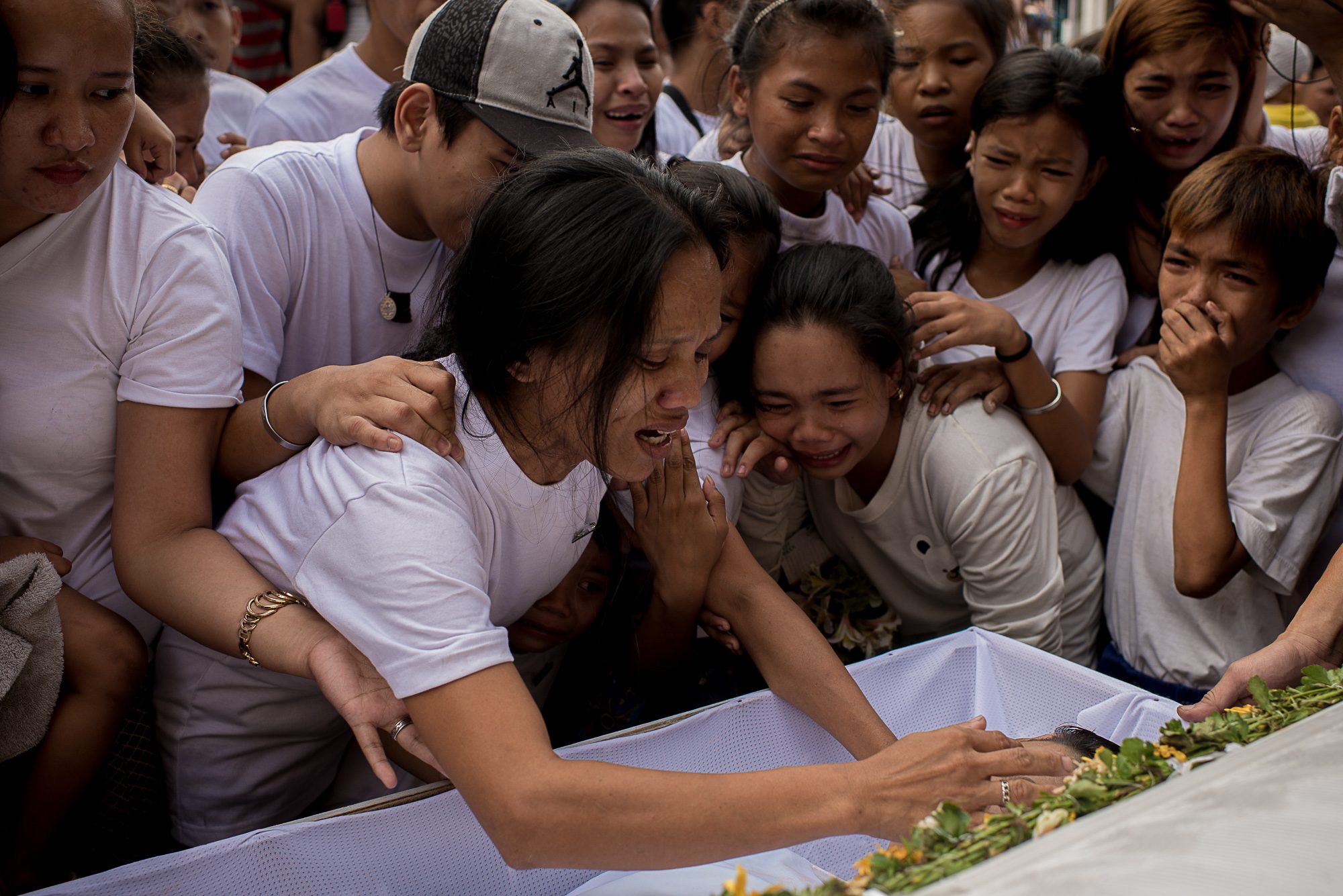 Tondo teenager killed by Manila cop buried; family seeks justice