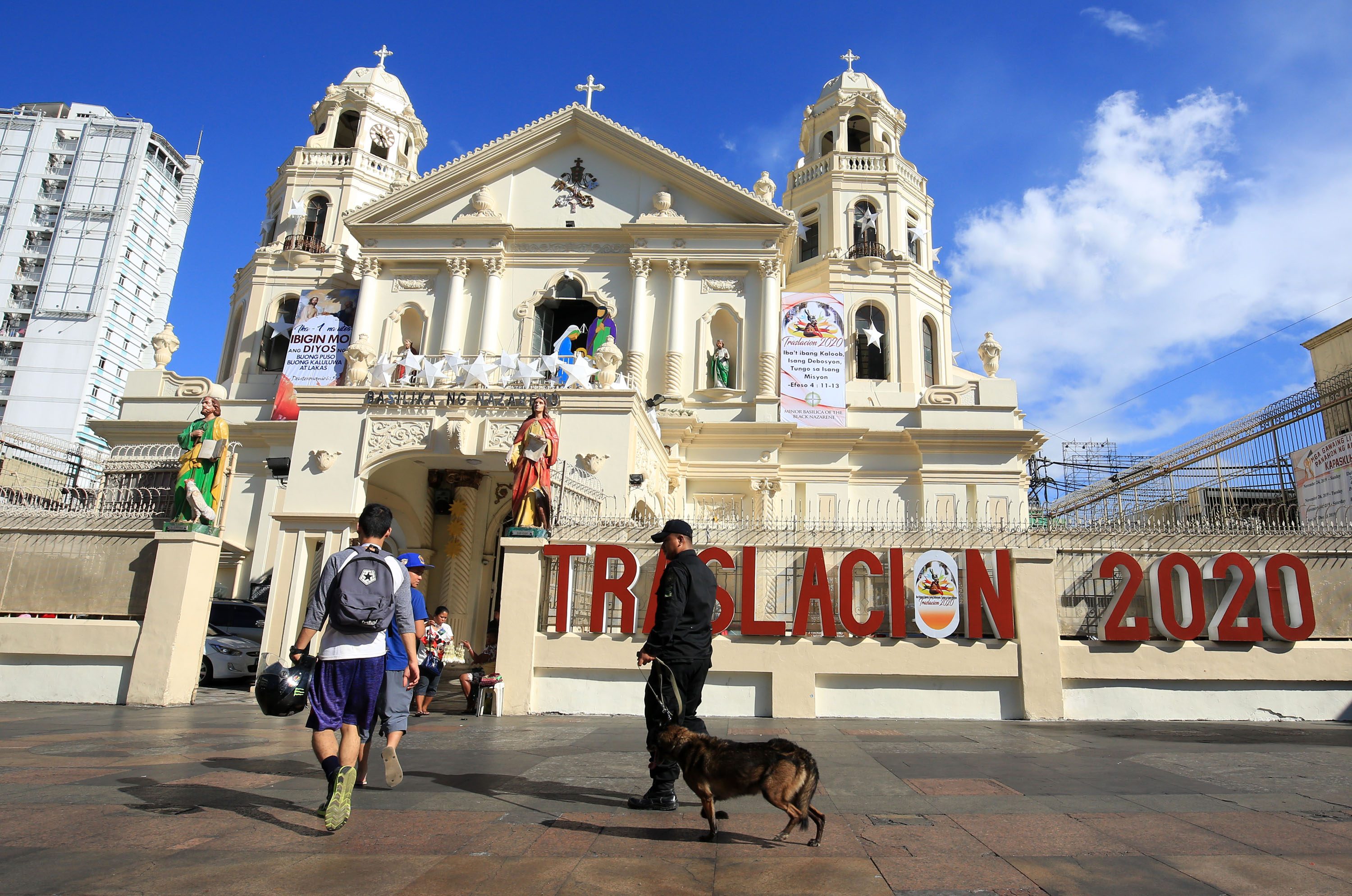INCREASED SECURITY. A K9 unit roams the vicinity of the Plaza Miranda fronting the Minor Basilica of the Black Nazarene in Quiapo, Manila. Photo by Ben Nabong 