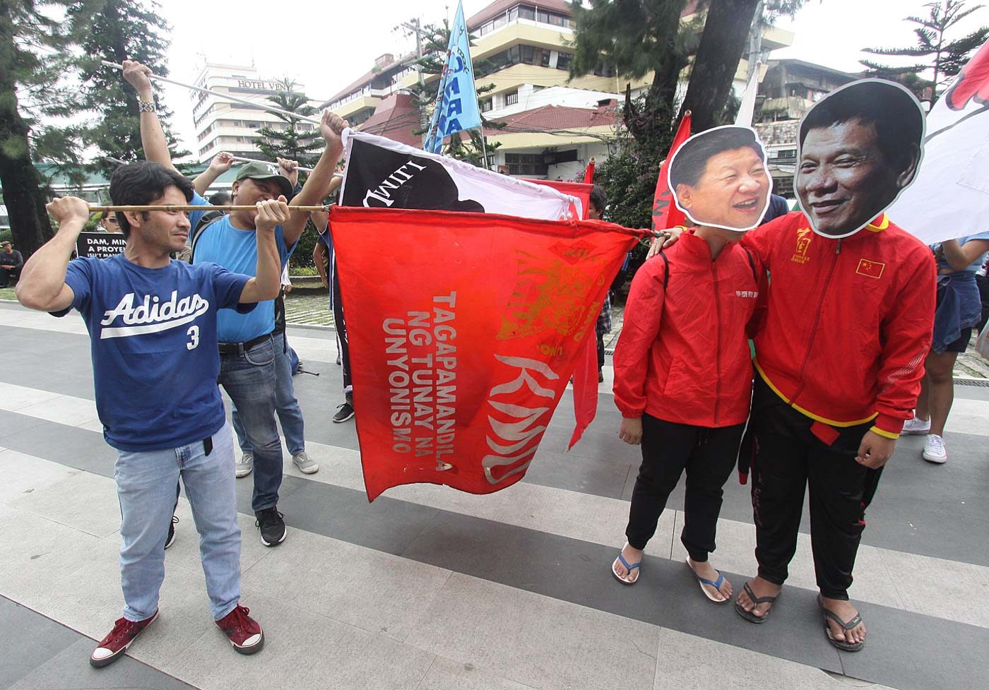 BAGUIO CITY. Protesters wear masks of Chinese President Xi Jinping and President Rodrigo Duterte on Monday, July 22. Photo by Mau Victa/Rappler  