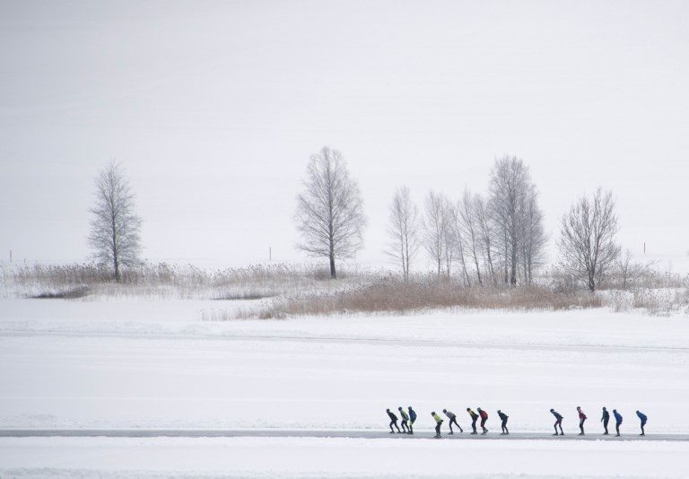 TRADITIONAL RACE. Dutch ice skaters participate in a 200km marathon on frozen Lake Weissensee in Austrian Alps on January 31, 2019, used as a replacement for a traditional race, the "Elfstedentocht". Photo by Joe Klamar/AFP  