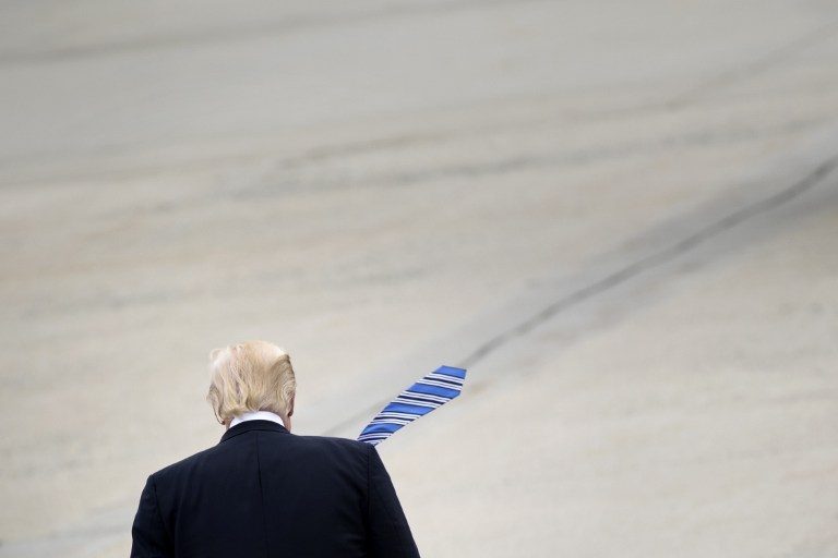 OFF HE GOES. US President Donald Trump walks to Marine One at Andrews Air Force Base May 13, 2017 in Maryland. Photo by Brendan Smialowski/AFP  