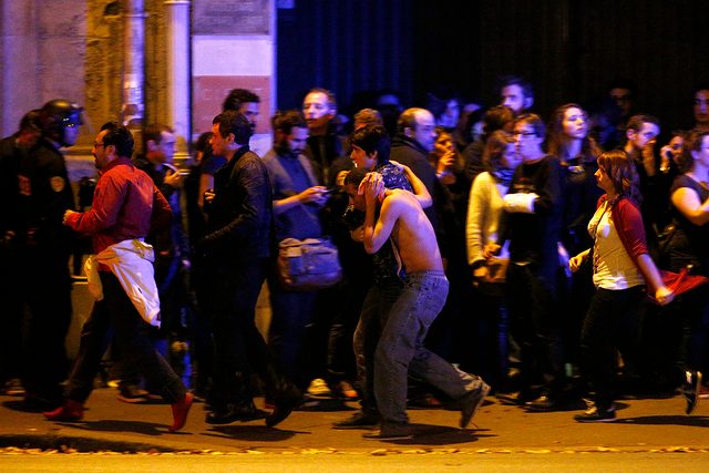 EVACUATED. Wounded people are evacuated outside the scene of a hostage situation at the Bataclan theatre in Paris, France, November 14, 2015. Photo by Yoan Valat/EPA