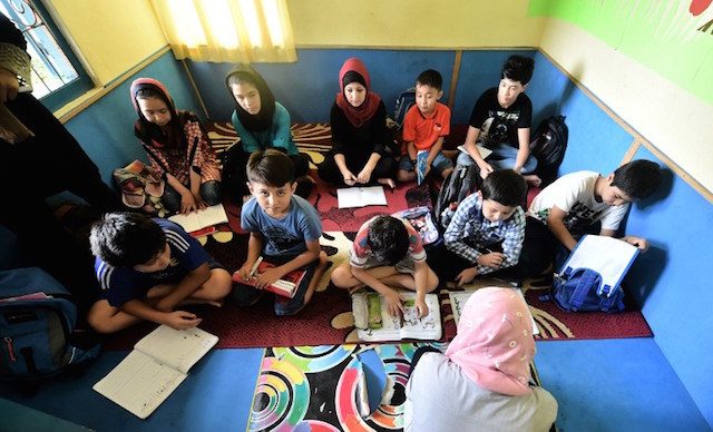In Indonesia, a school for refugees by refugees as they await resettlement