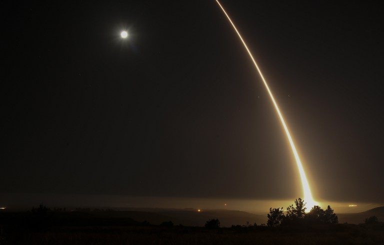 ICBM TESTING. A streak of light trails off into the night sky as the US military test fires an unarmed intercontinental ballistic missile at Vandenberg Air Force Base, Los Angeles, California, early on May 3, 2017. Photo by Ringo Chiu/AFP    
