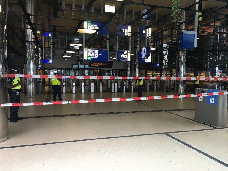 2 hurt in Amsterdam station stabbing, attacker shot by police
