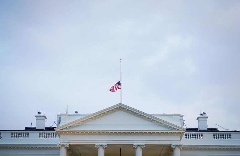 Trump, under pressure to honor McCain, orders flags to half-staff