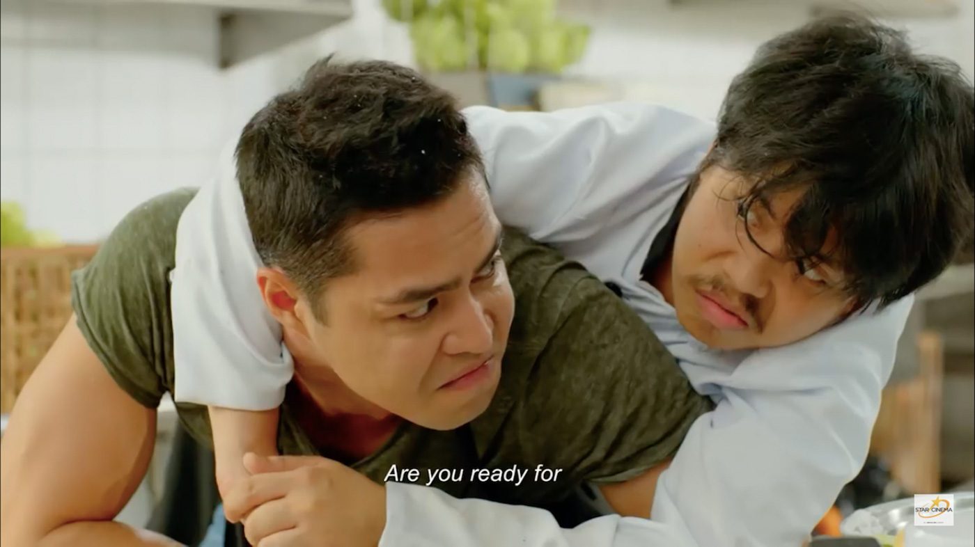 FRIENDS. Ronnie (Zanjoe) and Benjie (Empoy) find themselves teaming up for a cooking contest. Screenshot from YouTube/ ABS-CBN Star Cinema  